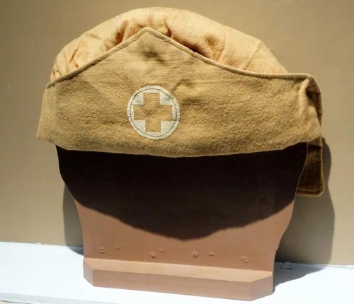 A tan-coloured, soft nurse’s cap.