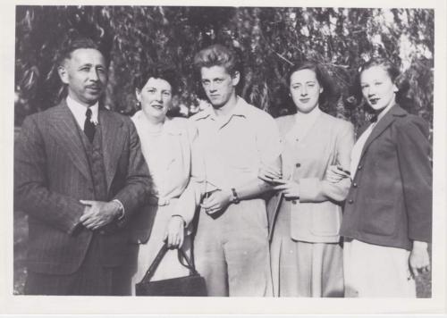 A black-and-white photograph of Byron Sisler and his family.