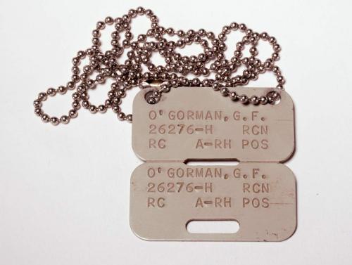 Rectangular metal dog tags.