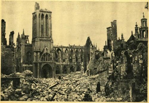 A black-and-white photograph of a church and a bombed-out street.