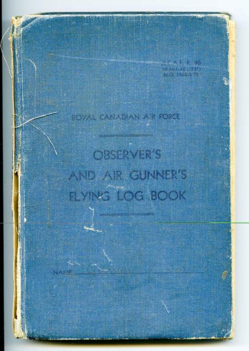 A blue hardcover book with pages on which to record a gunner’s flight  information.