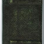 A small, black leather bound book used as wartime diary.