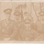 A sepia-toned photograph of Byron Cooper Sisler posing with soldiers from his  Air Force class.