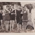 A black-and-white photograph of Byron Cooper Sisler with family and friends on a dock.