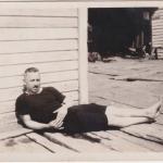 A black-and-white photograph of Byron Cooper Sisler relaxing.